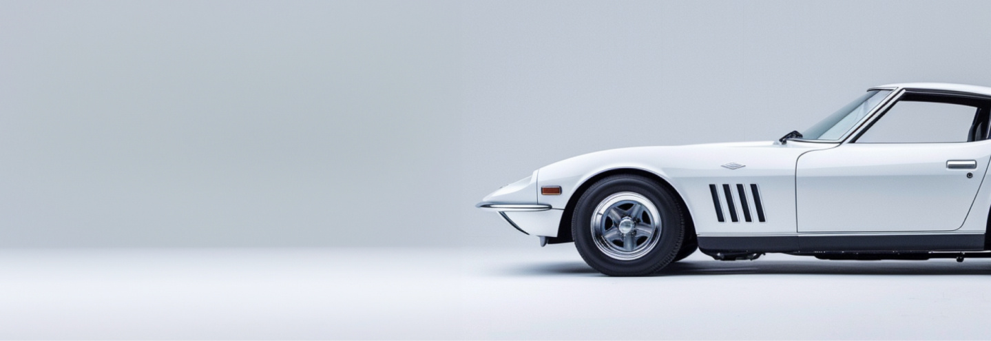 A white classic car on a white background