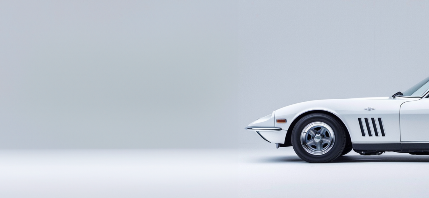 A white classic car on a white background